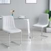 Table and chair set, one table and four chairs. Clear tempered glass table top, 0.3 feet thick, silver metal legs. Bow chair with electroplated metal